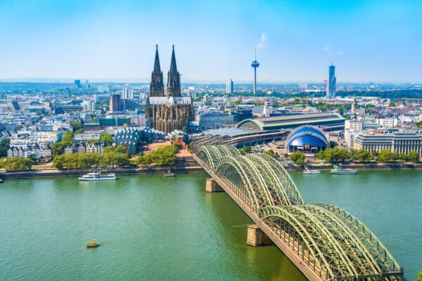 Cologne, North Rhine Westphalia, Germany: Beautiful panoramic aerial landscape of the gothic catholic Cologne cathedral, Hohenzollern Bridge and the River Rhine.